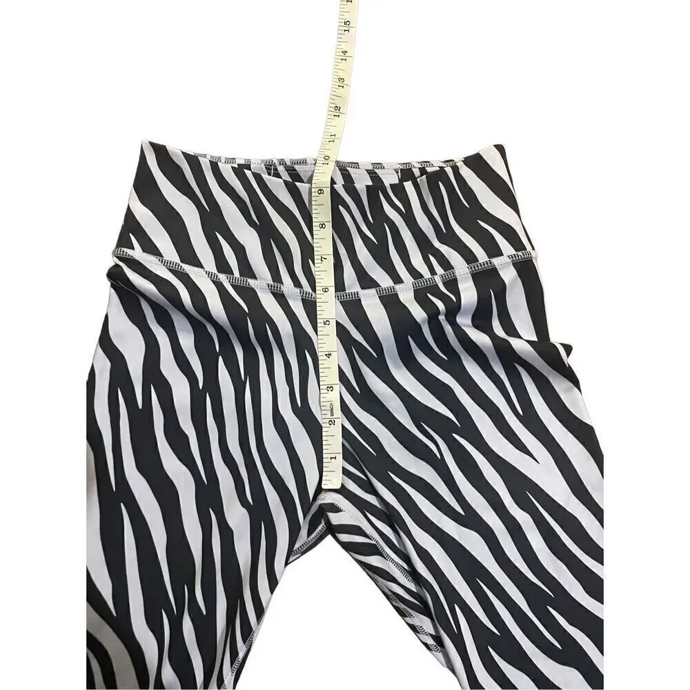The Nike One Tight Fit Mid Rise zebra animal‎ print leggings 7/8 length S